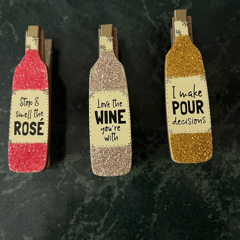 Wine clips.  lot of 3